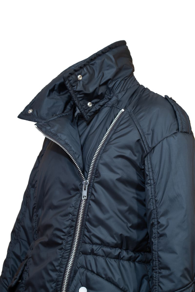 Model wearing Aster alpaca jacket standing on two stars